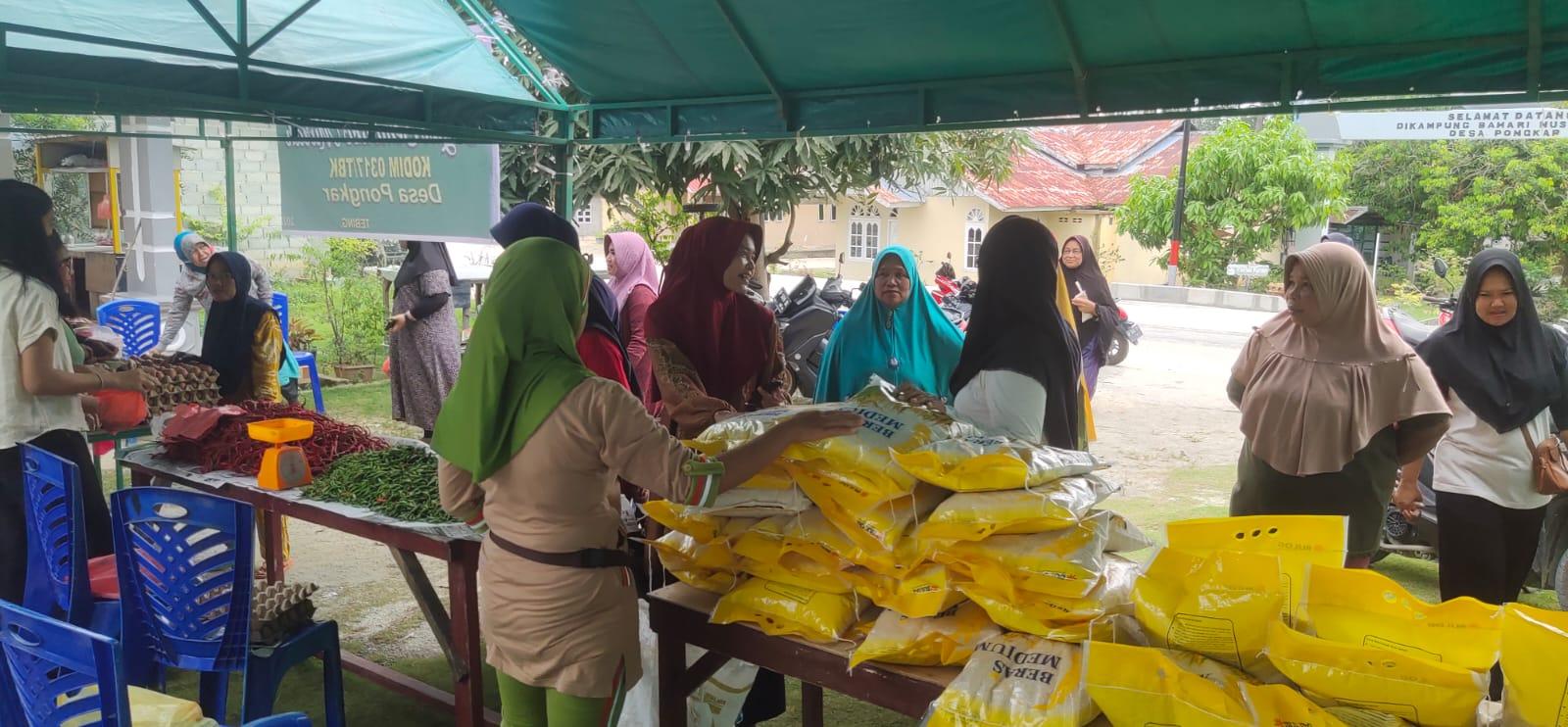 Kodim 0317/TBK beserta elemen Masyarakat melaksanakan kegiatan Bazar Murah